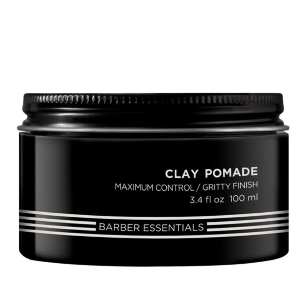Pot noir avec couvercle. Inscription: Clay Pomade, Barber Essentials. 3.4 fl oz 100 ml.