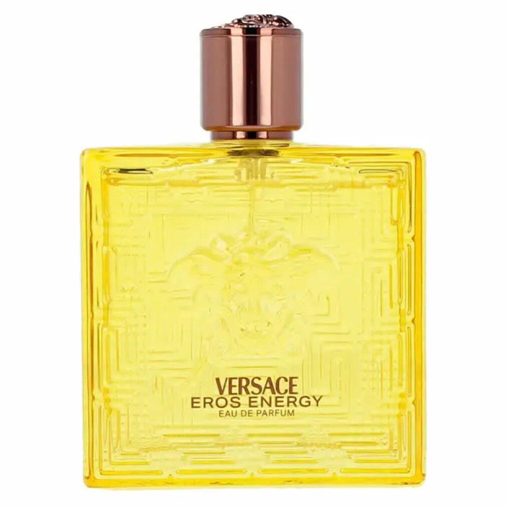 Flacon jaune Versace Eros Energy EdP. Forme carrée, logo Méduse en relief et motif géométrique. Bouchon marron.