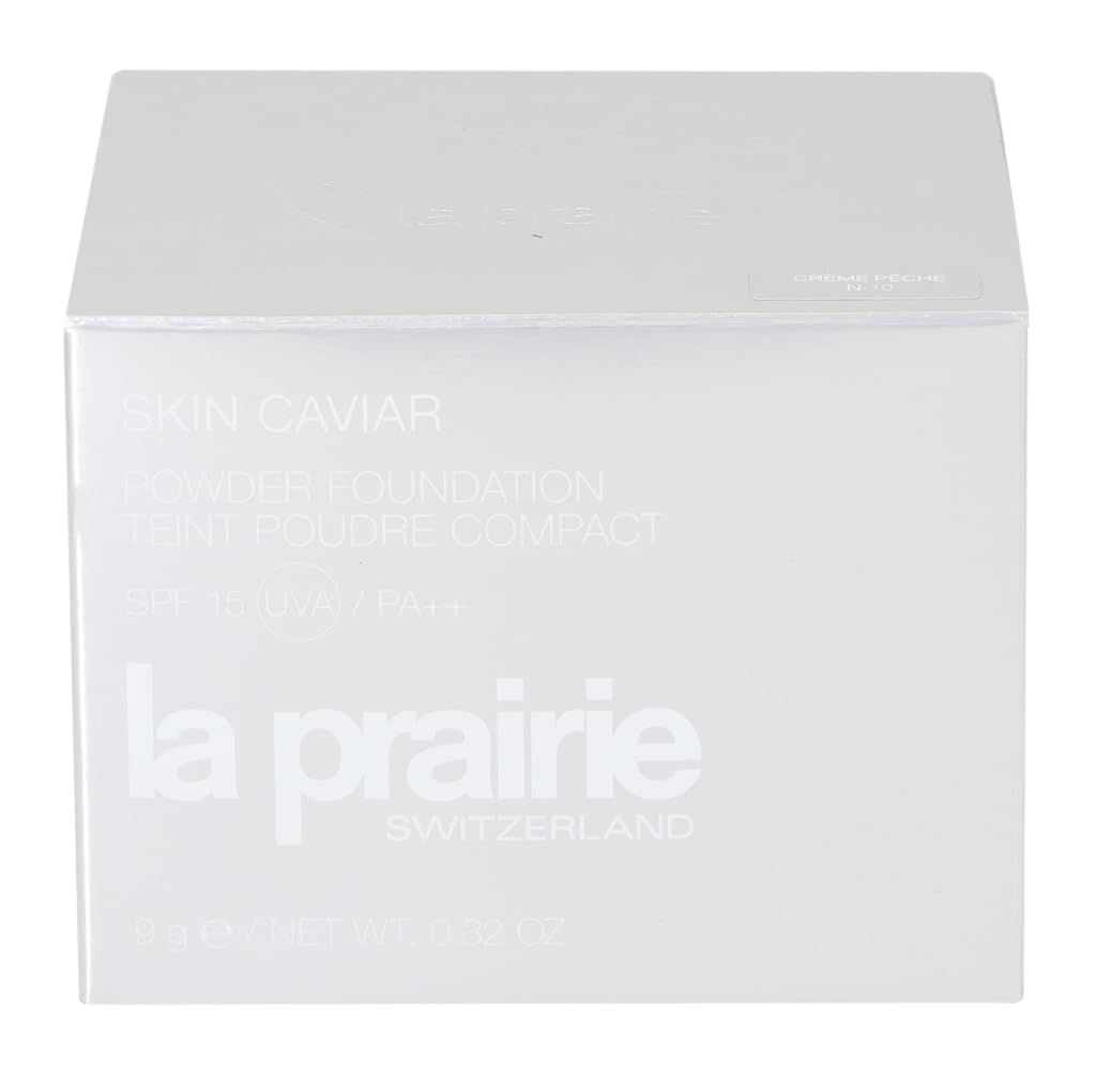 Boîte cosmétique blanche. Inscription: Skin Caviar, Powder Foundation, SPF 15, La Prairie, Switzerland. Contenu non visible.
