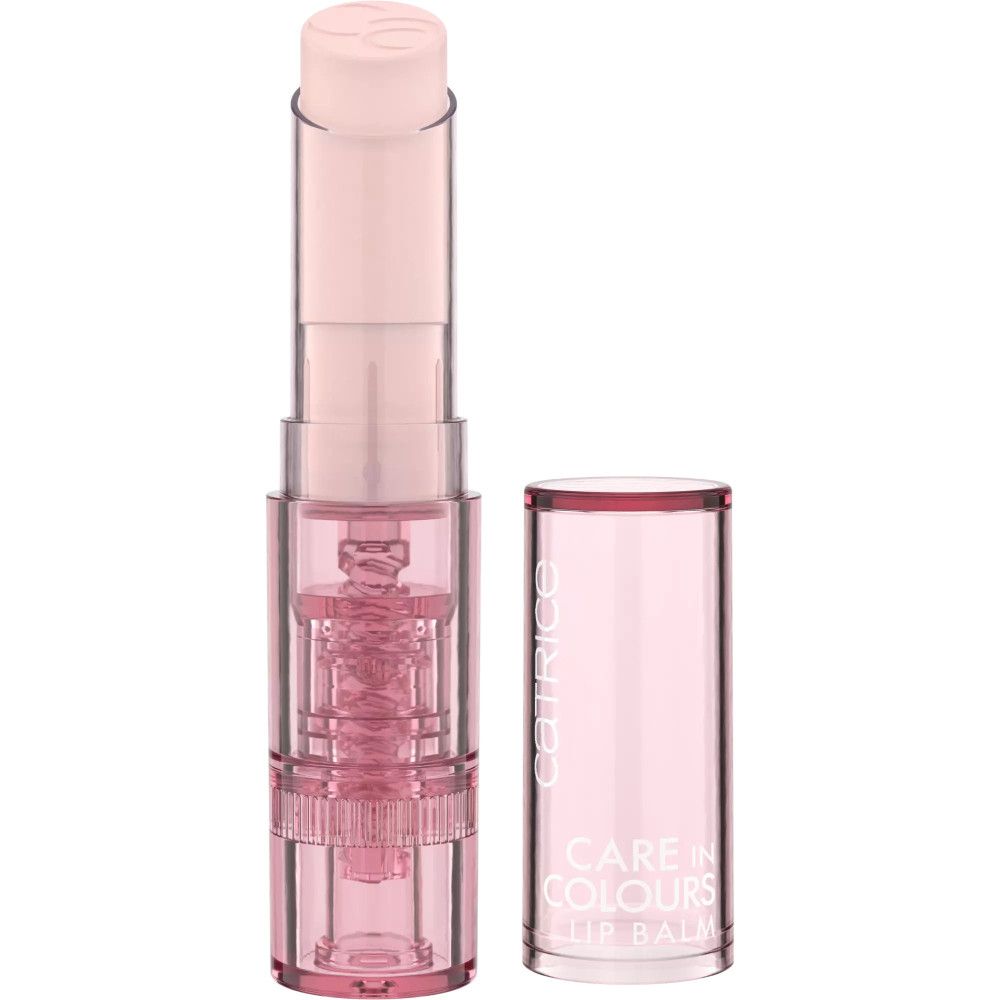 Baume à lèvres Catrice Care In Colours. Emballage transparent, baume rose. Inscription Care In Colours et Lip Balm.
