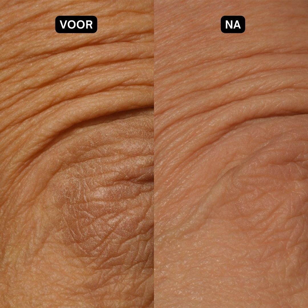 Crèmetube "Dr. SEA Revitalizing Body Cream Retinol" met tekst en illustraties. Achtergrond met bloem.
