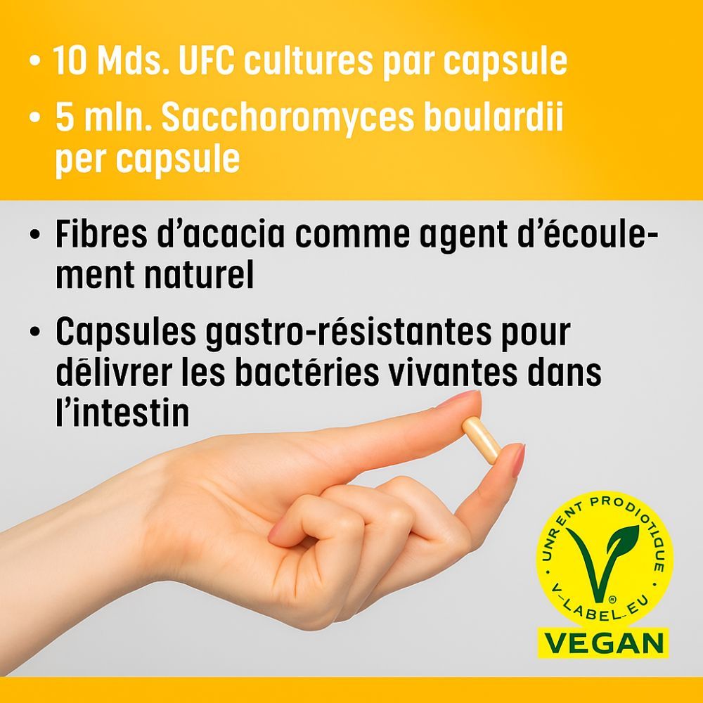 Main tenant une gélule. Inscription : 10 Mds. UFC, 5 mln. Saccharomyces boulardii. Label Vegan.