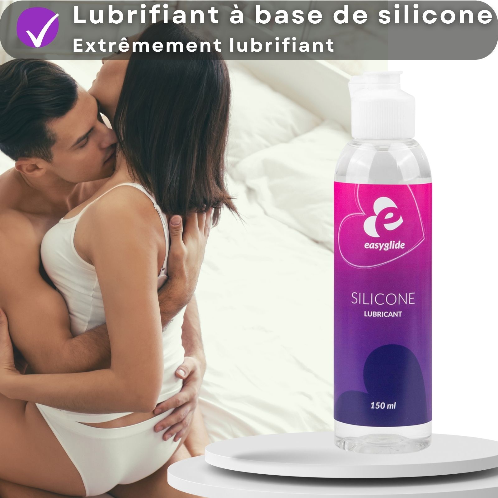 Flacon avec bouchon blanc. Inscription: Easyglide, Silicone Lubricant. 150 ml. Fond: femme.