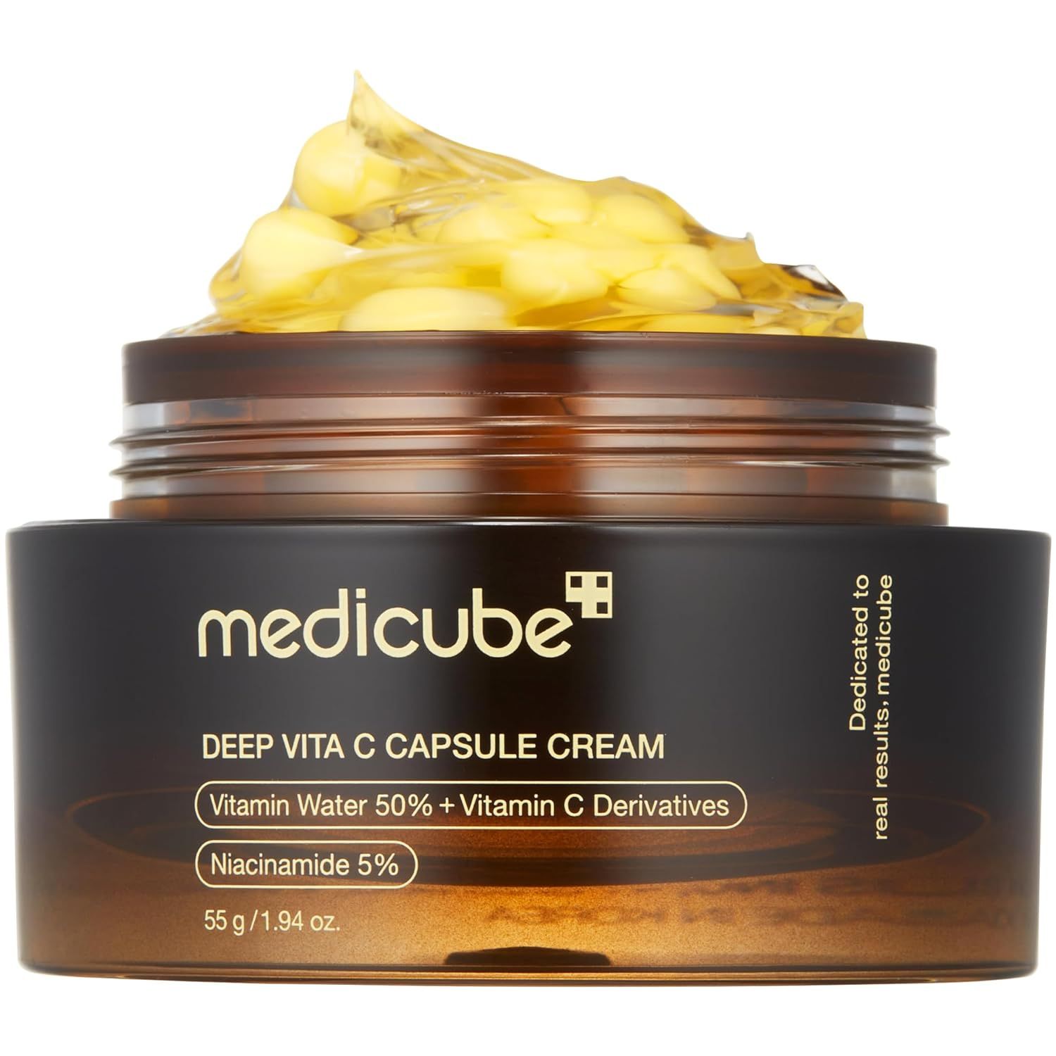 Bruine glazen pot met gele inhoud. Opschrift: medicube, Deep Vita C Capsule Cream, Vitamin Water 50% + Vitamin C Derivatives.