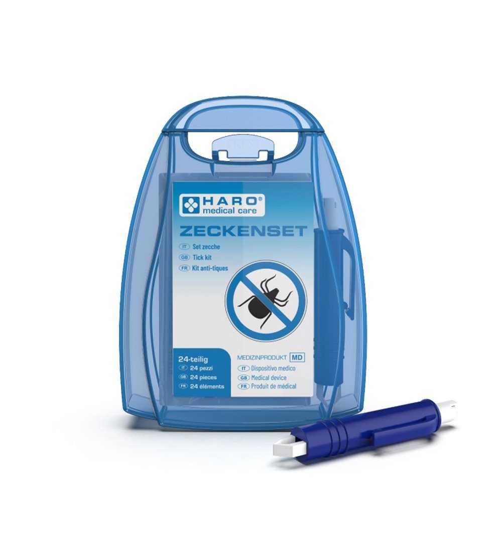 Étui en plastique bleu avec inscription Zeckenset. Contient 24 pièces. Un outil bleu est à côté.