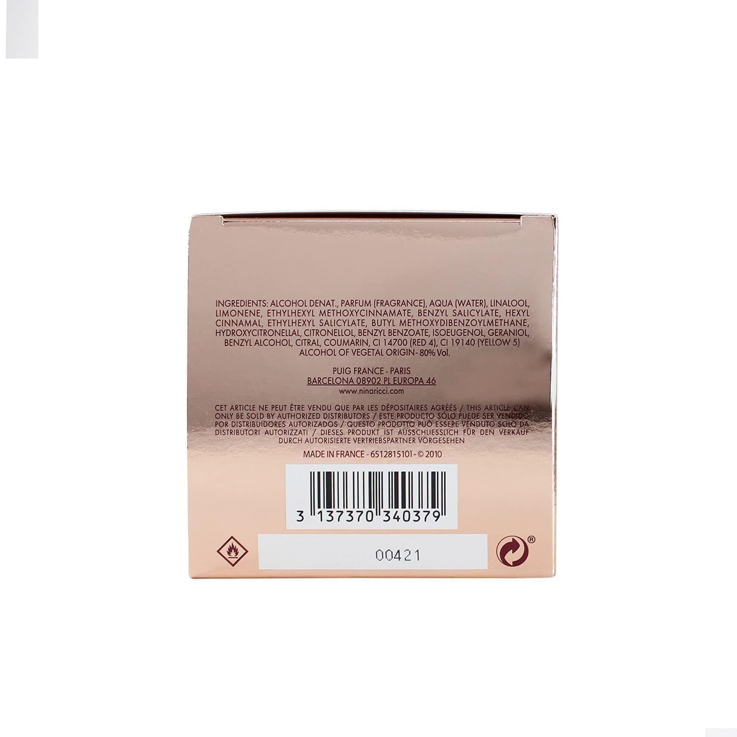 Achterkant van de verpakking. Bevat ingrediënten, herkomstinformatie en barcode. Tekst in meerdere talen.