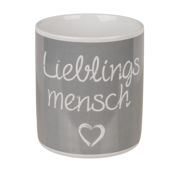 Grijze beker met witte rand. Opschrift "Lieblingsmensch" en hart. Cilindrische vorm.