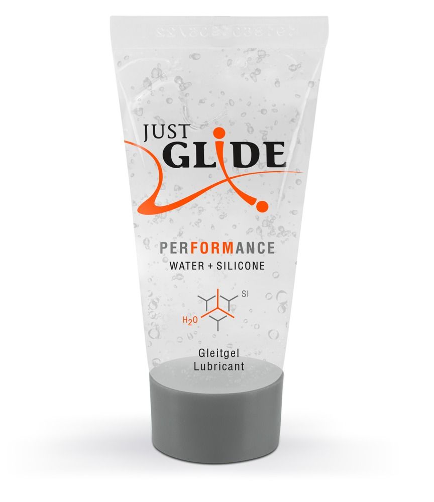 Tube met transparante gel. Opschrift: JUST GLIDE PERFORMANCE. Water + Silicone. Medisch glijmiddel.