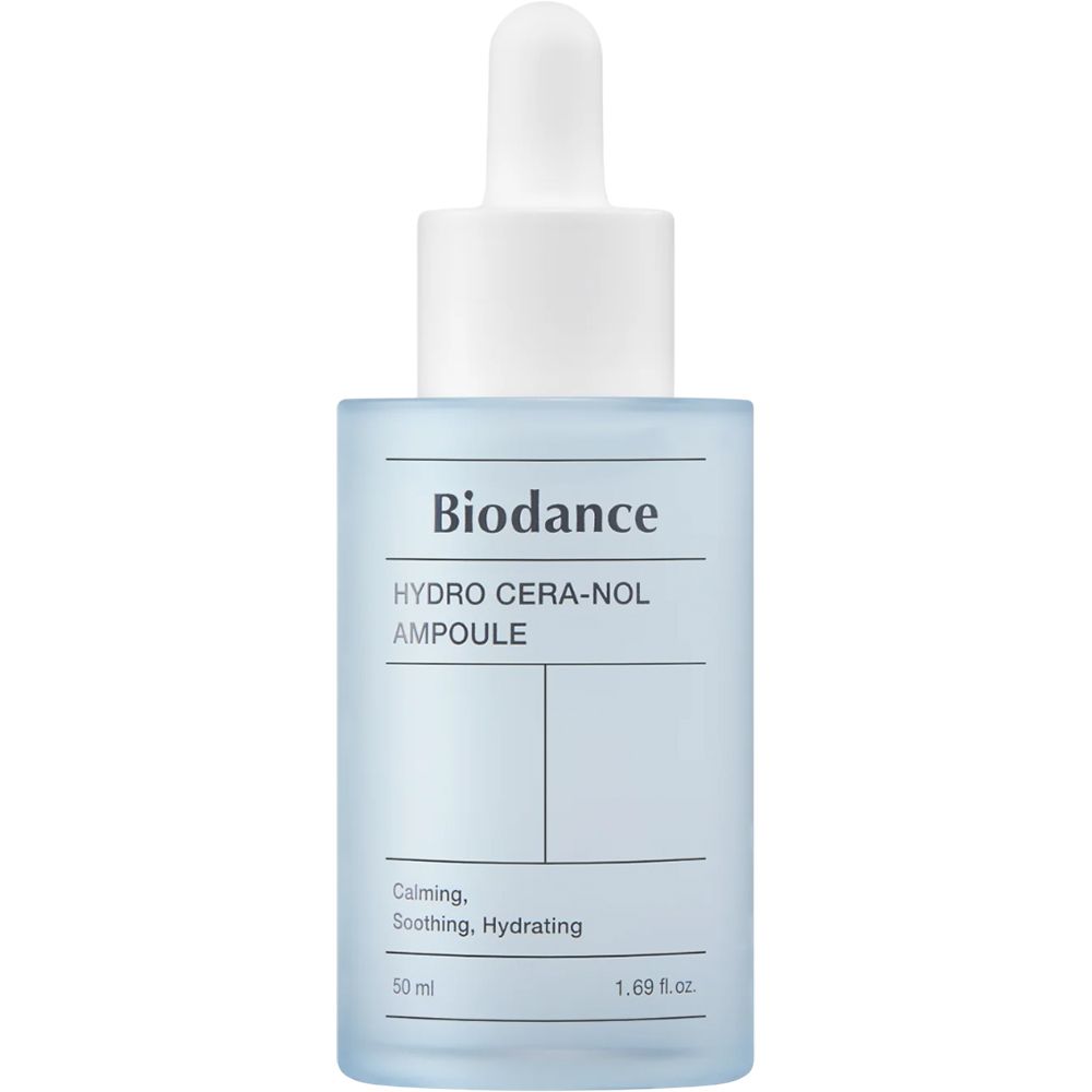 Lichtblauw serumflesje met witte dop en pipet. Opschrift: Biodance Hydro Cera-nol Ampoule. Tekst: Calming, Soothing, Hydrating.