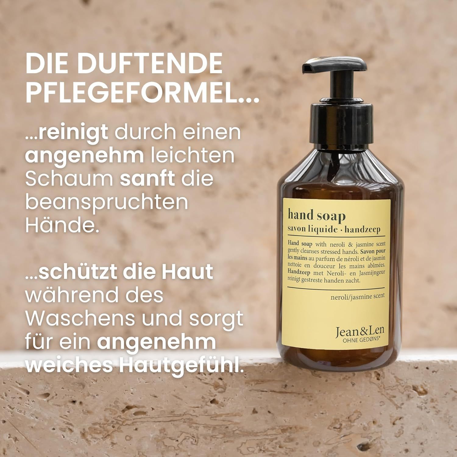 Bruine fles handzeep met zwarte pomp. Opschrift: Hand Soap, Neroli & Jasmin geur, Jean & Len.