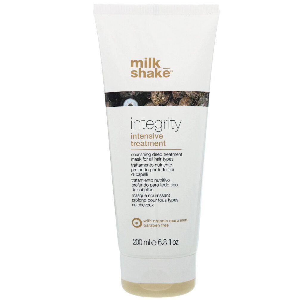 Wit-beige tube. Opschrift: milk shake, integrity, intensive treatment. Meertalige tekst. 200 ml.