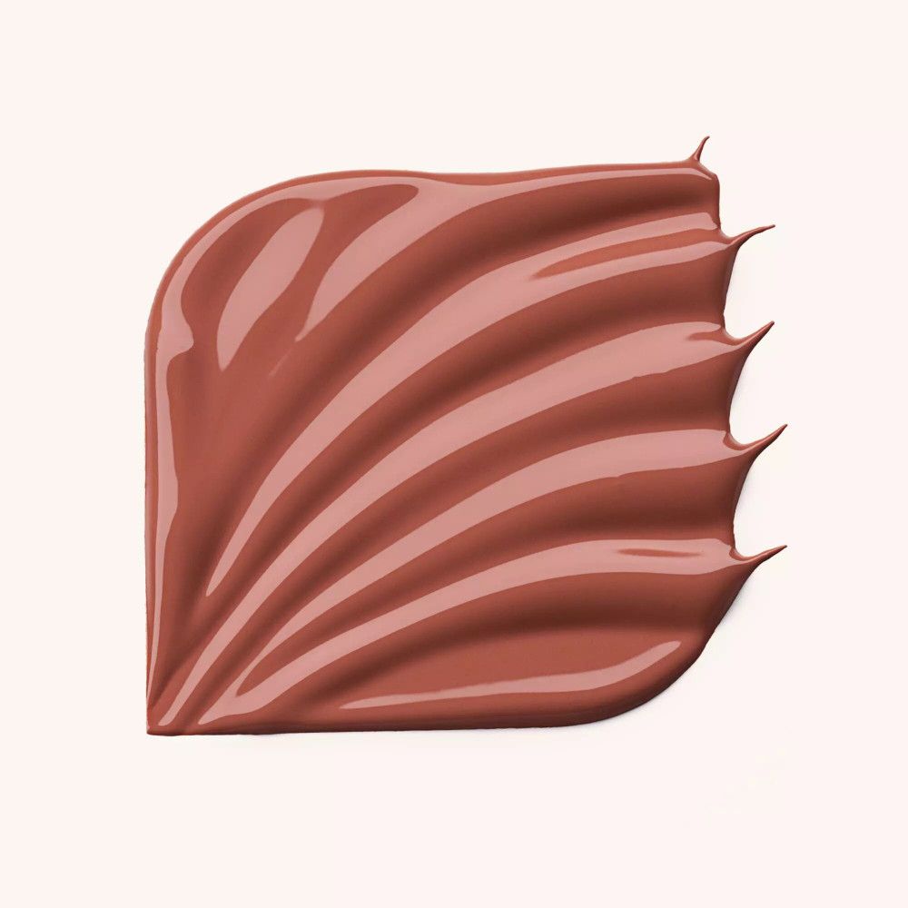 Nuance de vernis à lèvres étalée. Teinte rose avec fini brillant. Texture ondulée.