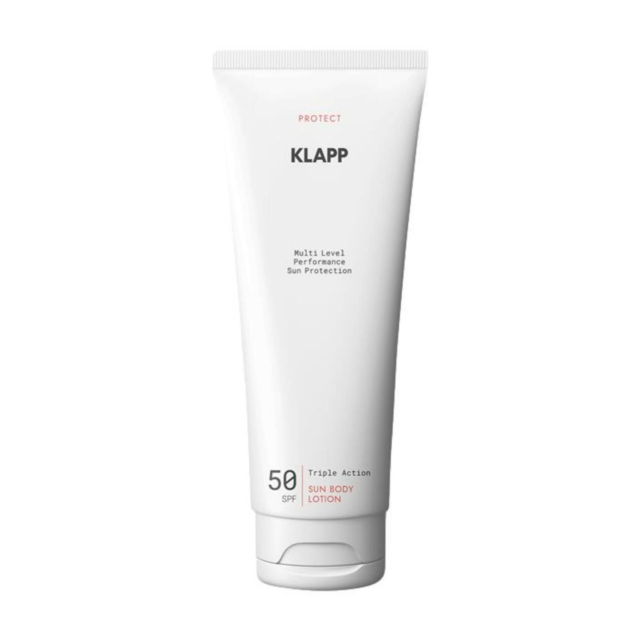 Witte tube met productinformatie. Opschrift: KLAPP, Multi Level Performance, 50 SPF, Sun Body Lotion. Witte dop.