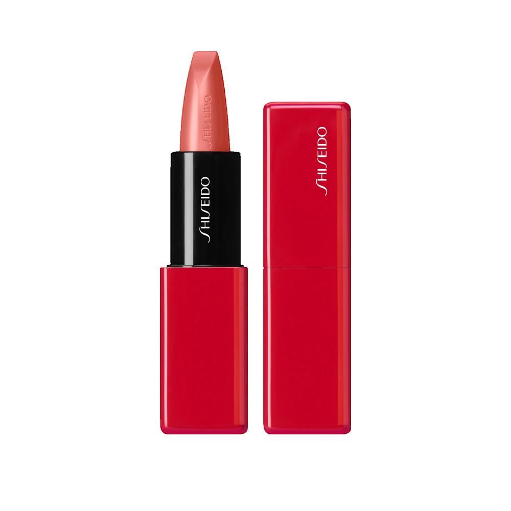 Rouge à lèvres rouge avec capuchon ouvert. Le rouge à lèvres est rose clair. "SHISEIDO" est écrit sur le boîtier.