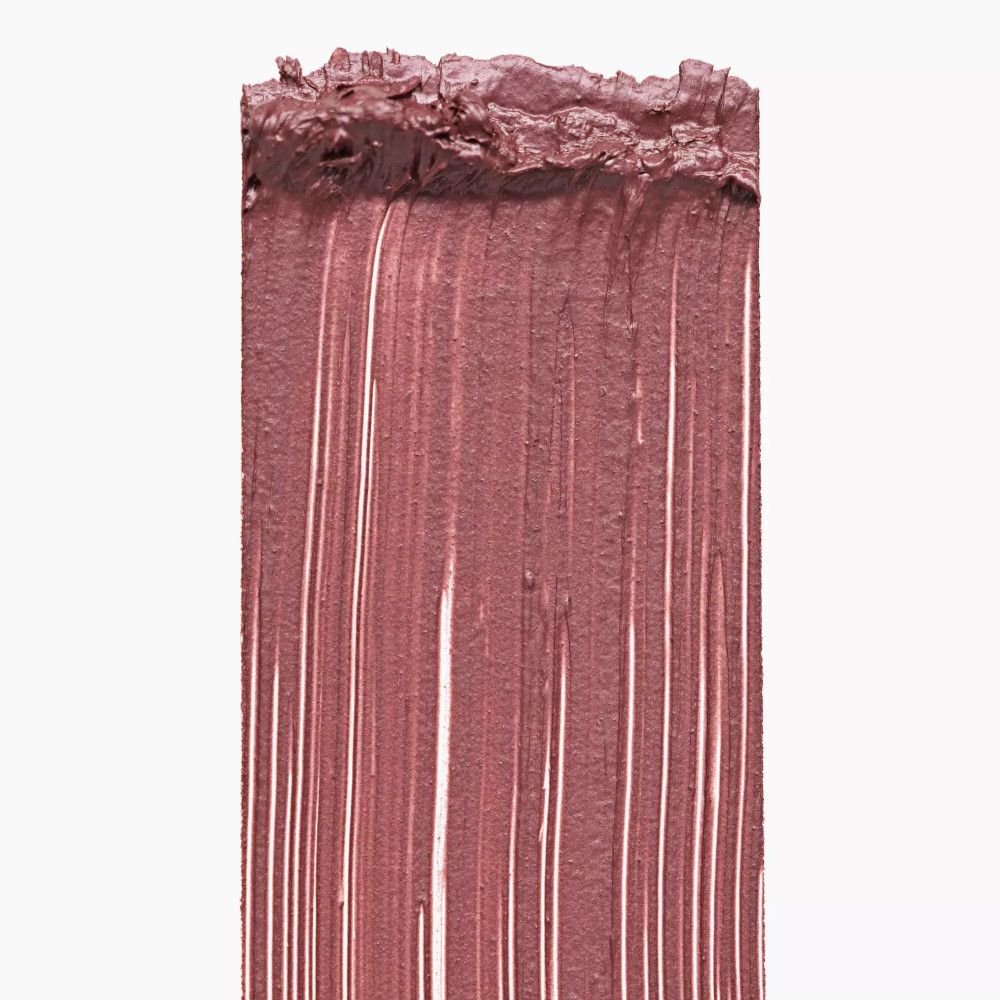 Échantillon de mascara rose-brun. Coups de pinceau verticaux avec bord supérieur irrégulier.