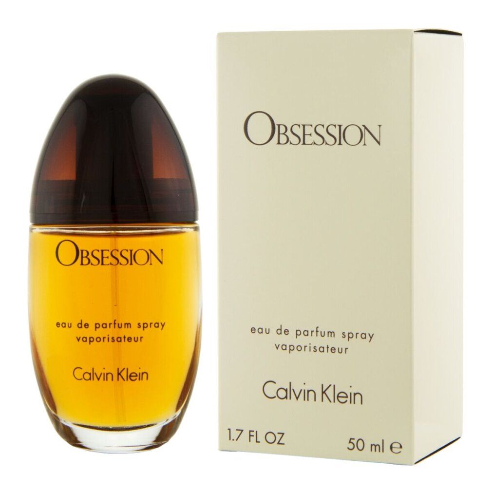 Parfumfles en doos. Opschrift: Obsession, Eau de Parfum Spray, Calvin Klein. Fles: 50 ml, 1.7 FL OZ.