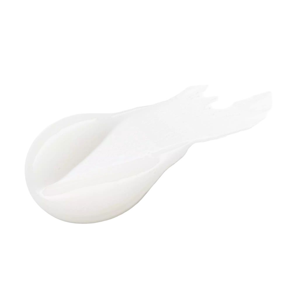 Uitgesmeerd, wit product. Glanzende textuur. Vorm doet denken aan een gebogen traan.