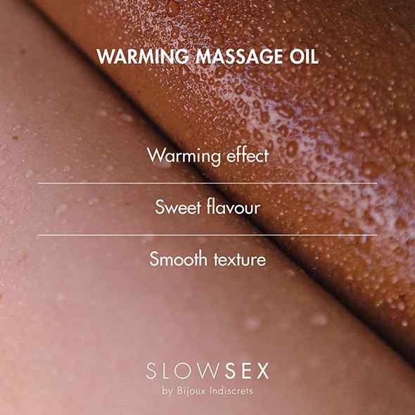 Texte sur la peau : Warming Massage Oil, Warming effect, Sweet flavour, Smooth texture. Inscription : SLOW SEX by Bijoux Indiscrets.