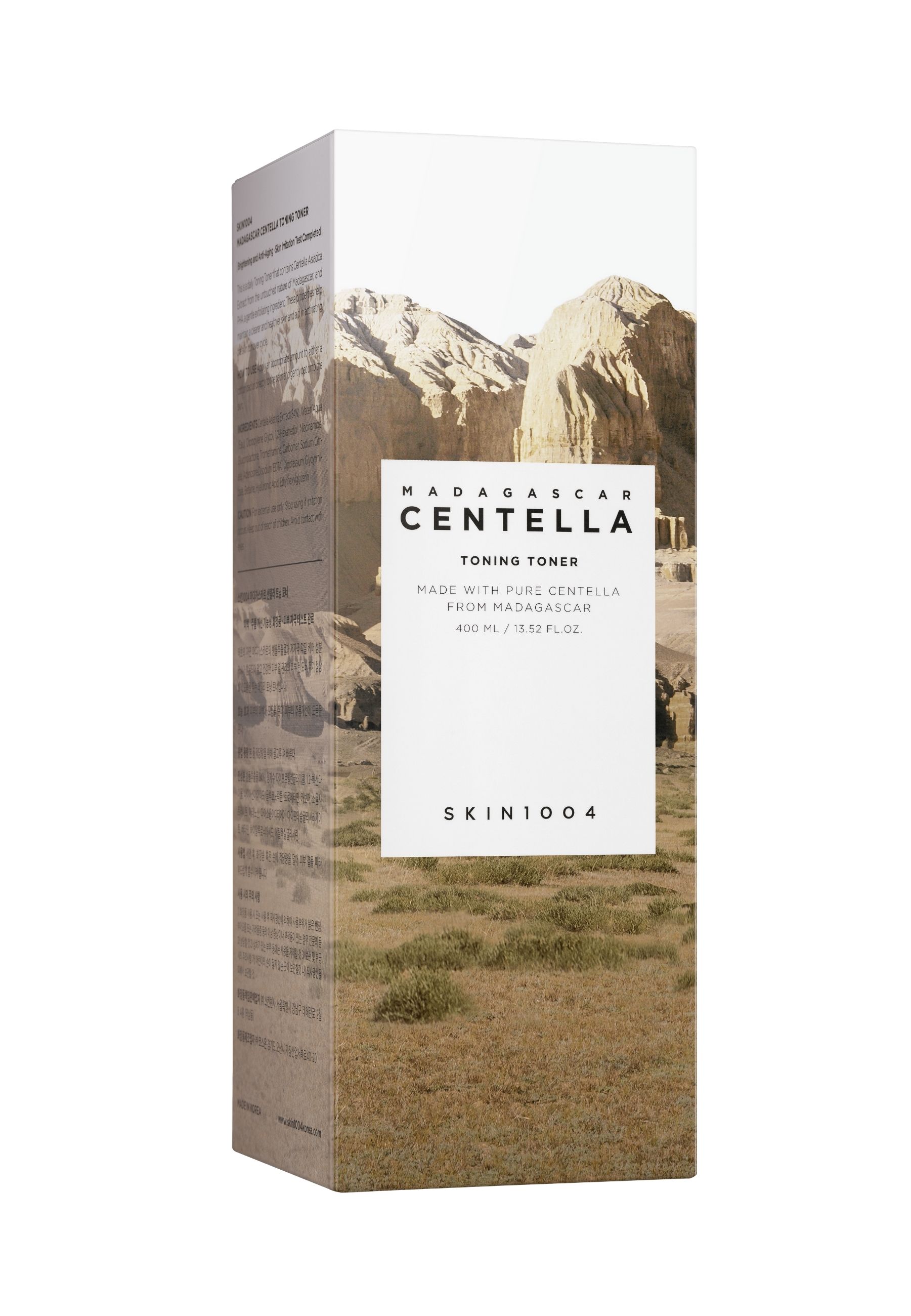 Kartonnen verpakking met productinformatie en landschapsfoto. Tekst: MADAGASCAR CENTELLA Toning Toner.