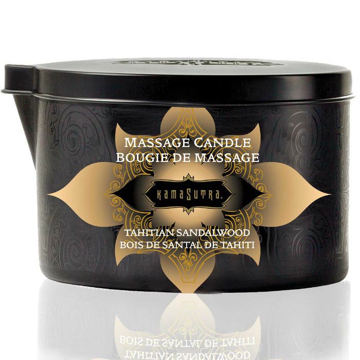 Bougie de massage noire avec motif doré et texte. Boîte avec bec verseur. Nom du produit et parfum.