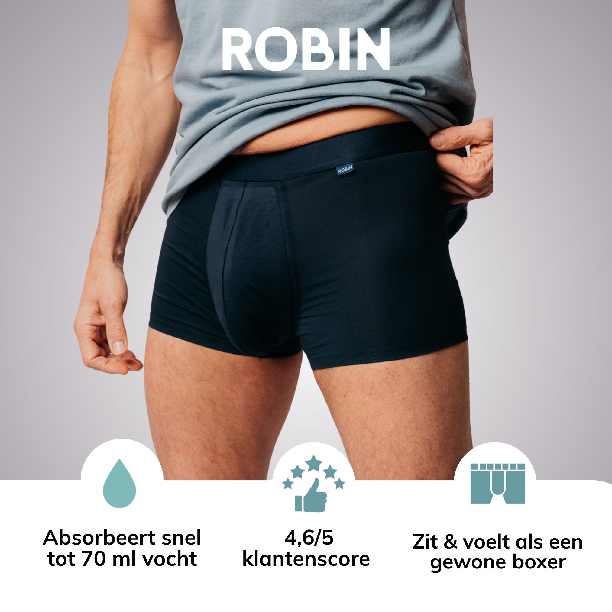 Donkerblauwe boxer met "ROBIN" logo, absorptie tot 70 ml, hoge klantenscore.