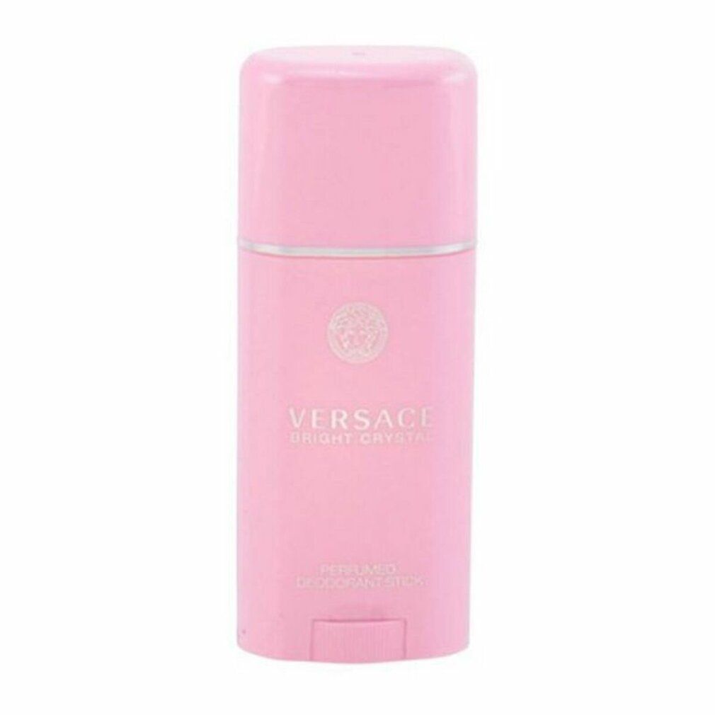 Roze deodorantstick. "Versace Bright Crystal" en "Perfumed Deodorant Stick" gedrukt. Zilveren ring en Versace-logo.