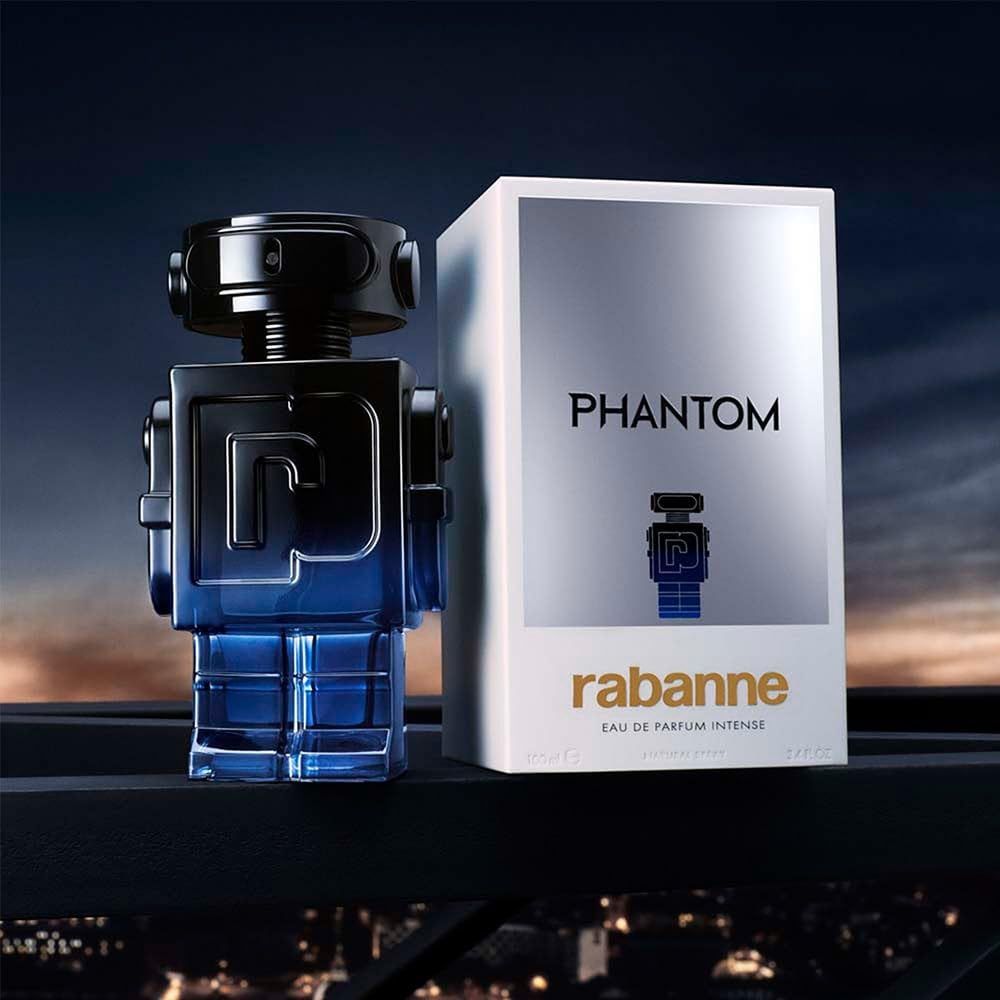 Flacon bleu-noir en forme de robot et emballage. Inscription : Phantom, Rabanne Eau de Parfum Intense.