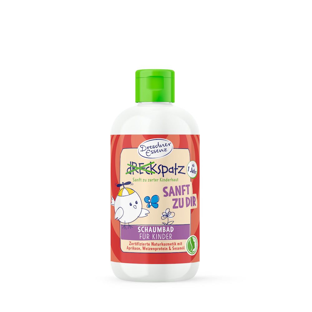 Witte fles met groene dop. Etiket met cartoonfiguur en tekst: SANFT ZU DIR. Product voor kinderen.
