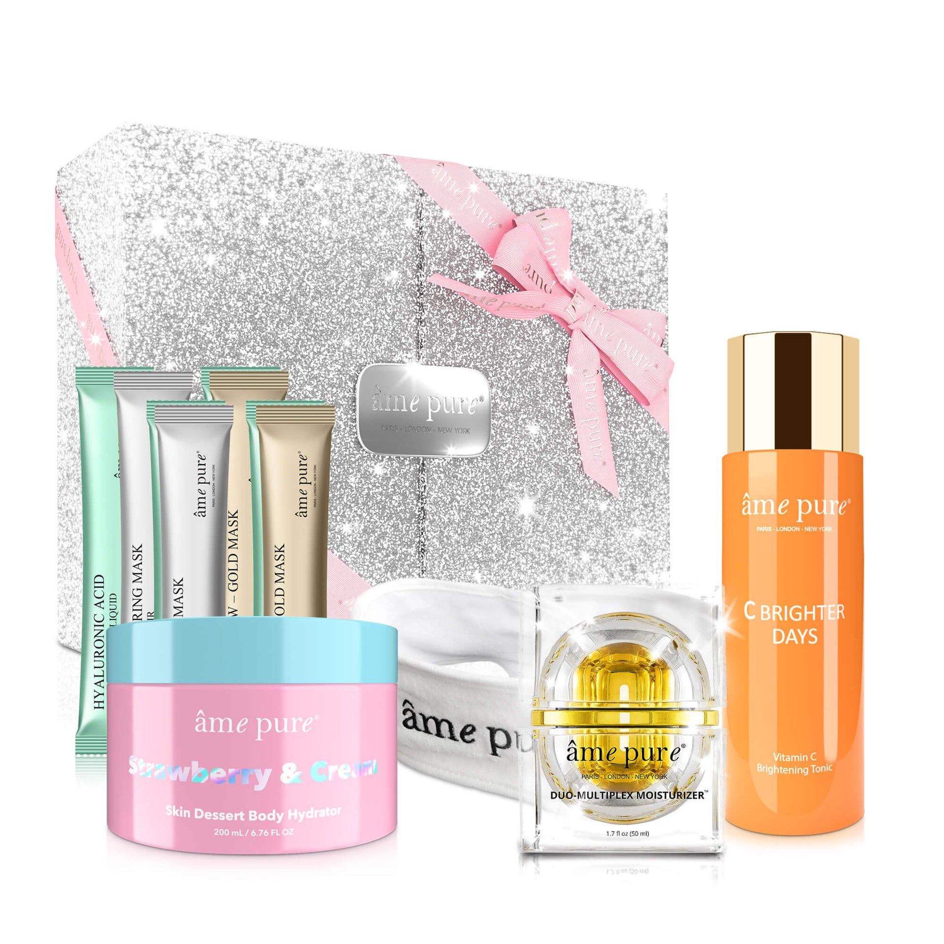 Coffret cadeau avec divers produits. Crèmes, masques, flacon et bandeau. Emballage scintillant.