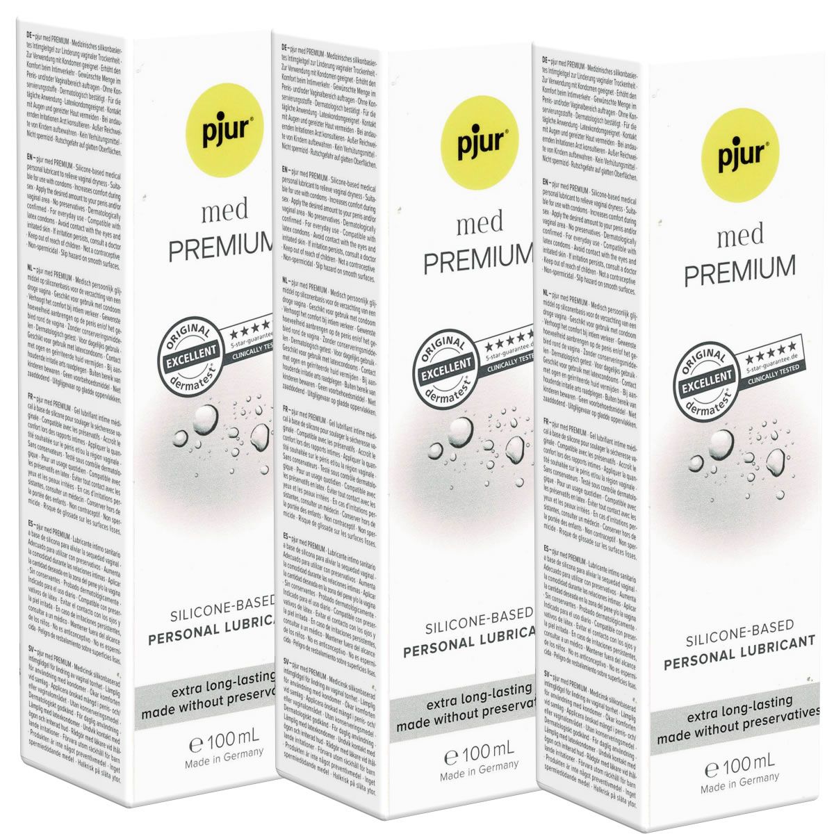 Drie witte dozen met tekst. Opschrift: pjur med PREMIUM, SILICONE-BASED PERSONAL LUBRICANT, dermatest-zegel.
