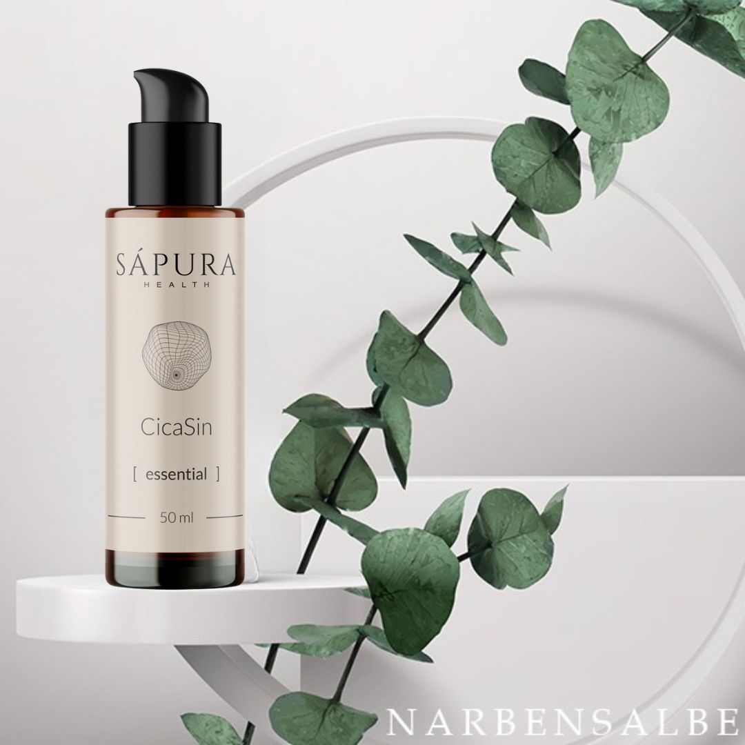 Distributeur à pompe CicaSin à côté de branches d'eucalyptus.