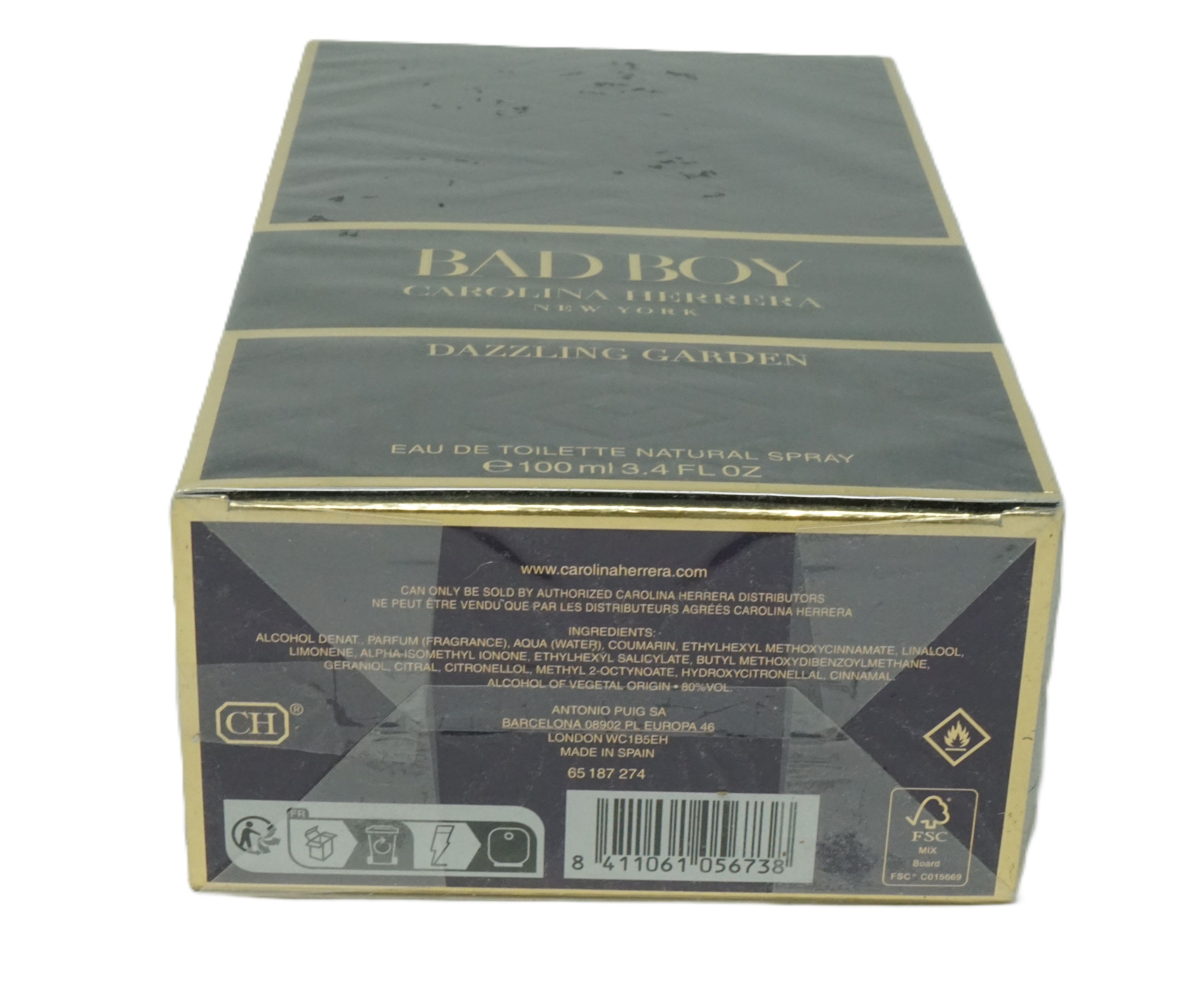 Zwarte doos met gouden details. Opschrift: Bad Boy Dazzling Garden. E 100 ml 3.4 FL OZ.