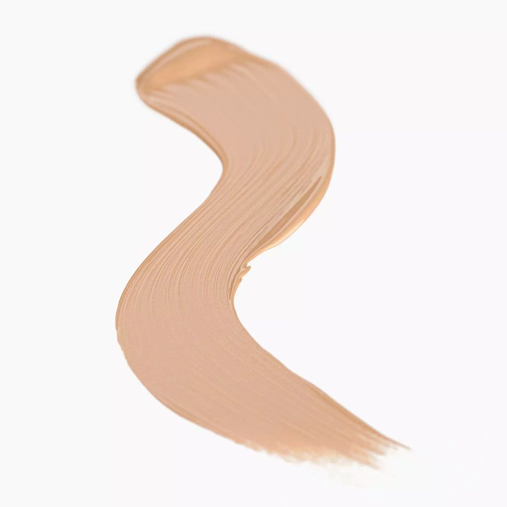 Trace de correcteur beige. En forme de vague sur fond blanc.