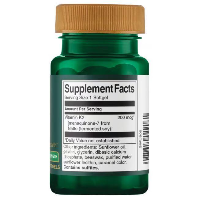Dos d'une bouteille verte avec bouchon marron. Étiquette avec informations nutritionnelles: Vitamine K2, 200 mcg. Contient 1 gélule.
