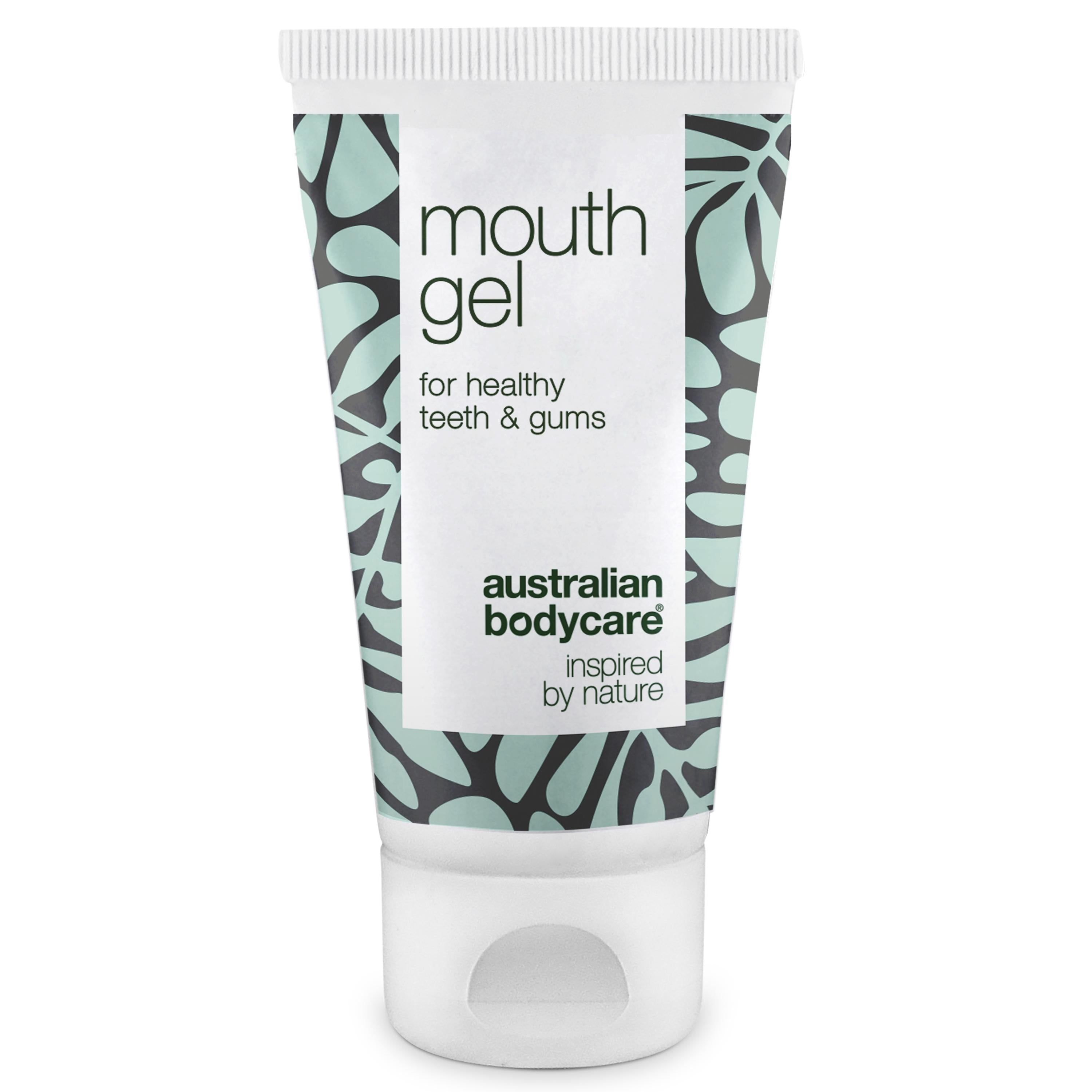 Tube de gel buccal avec motif floral. Texte : mouth gel, for healthy teeth & gums, Australian Bodycare.