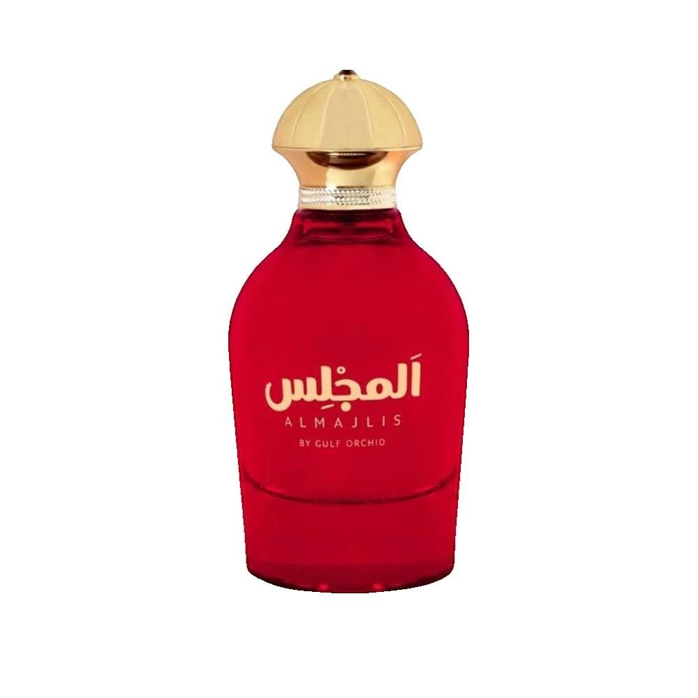 Rode parfumfles met gouden dop. Arabische letters en Engelse tekst.