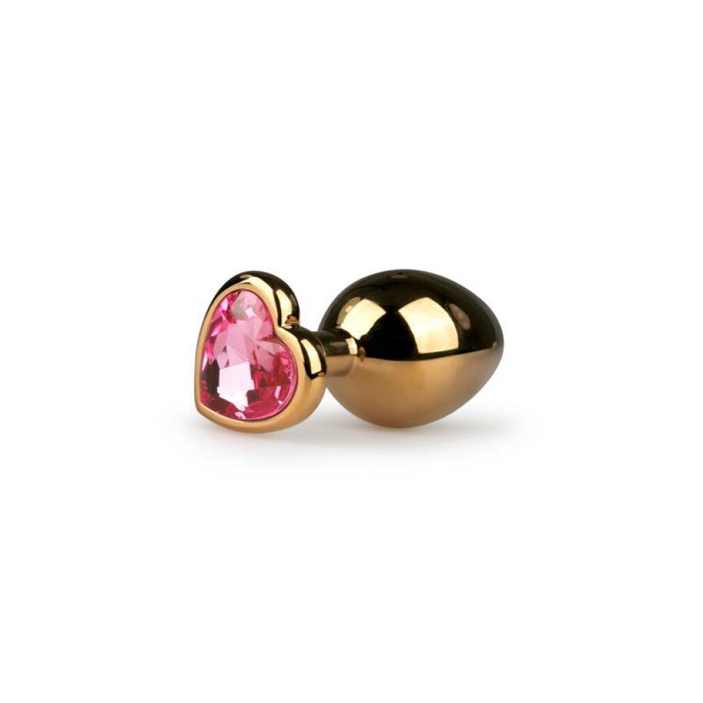 Gouden anale plug met roze hartvormige siersteen.