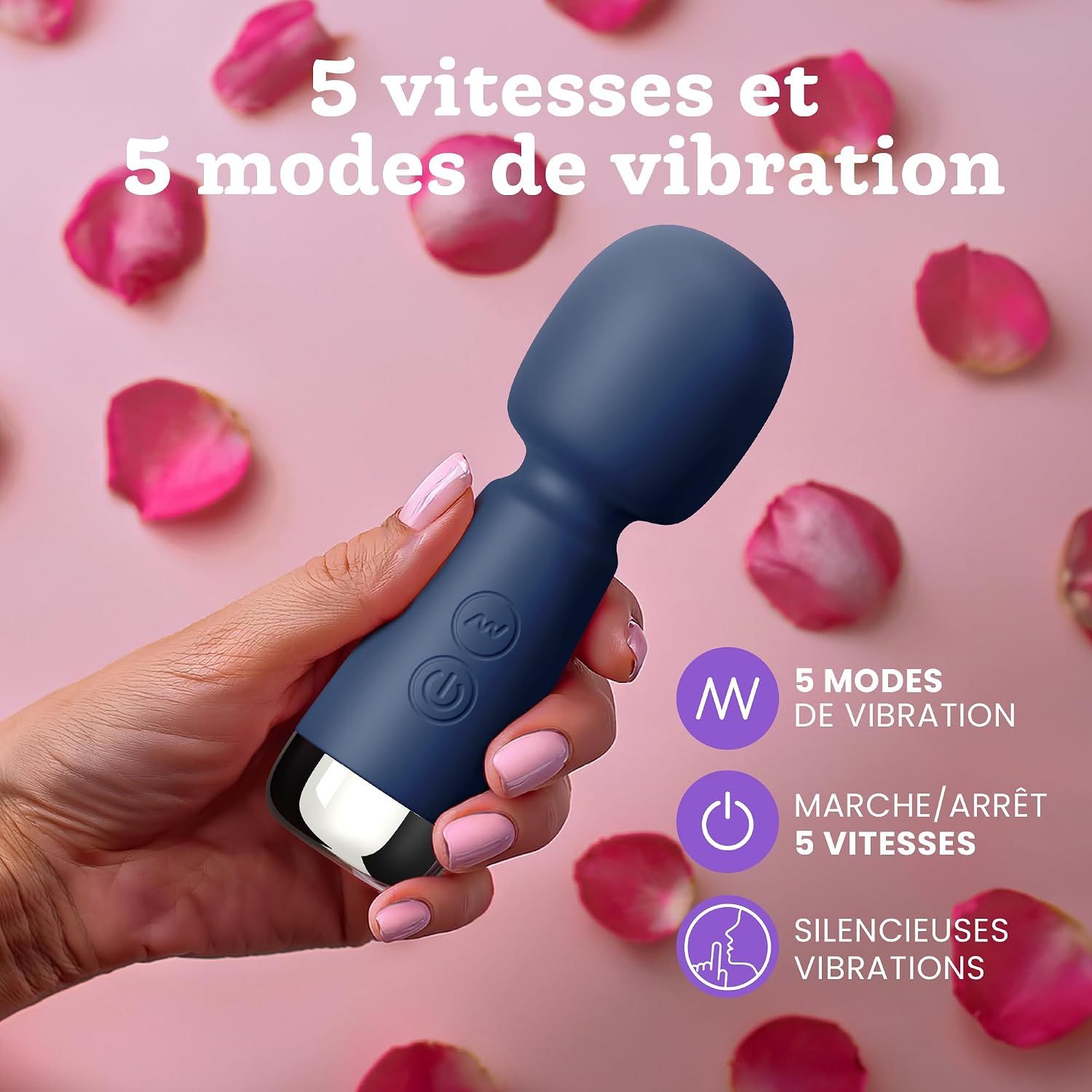 Vibrateur bleu foncé avec capuchon argenté, tenu par une main. 5 modes de vibration, 5 vitesses.