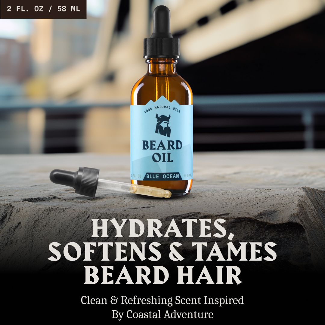 Huile à barbe Striking Viking 'Blue Ocean', 2 fl oz / 58 ml, posée sur une pierre avec pipette.