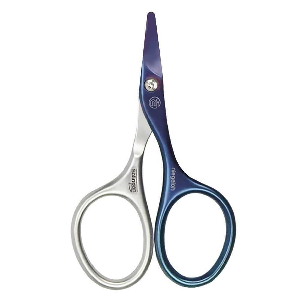 Ciseaux pour bébé Niegeloh Solingen. Lames bleu acier, auto-affûtantes. Poignées en acier inoxydable.