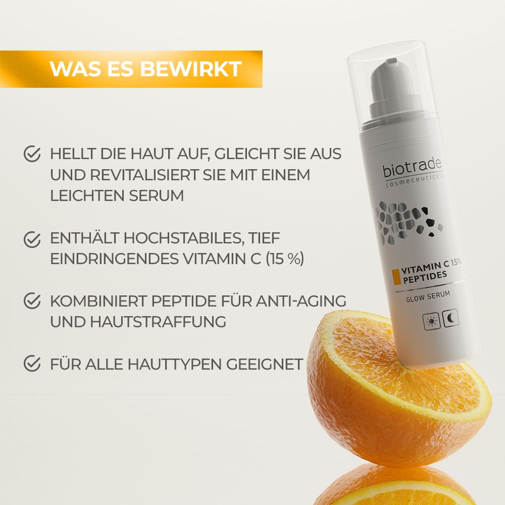 Sérum Biotrade à la vitamine C et peptides. Flacon blanc avec pompe, à côté d'une tranche d'orange. Texte : Vitamin C 15% Peptides.