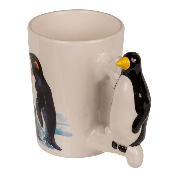 Beker met pinguïngreep. Wit, met pinguïndecoratie en een pinguïn als handvat. Gele snavel, zwart en wit van kleur.