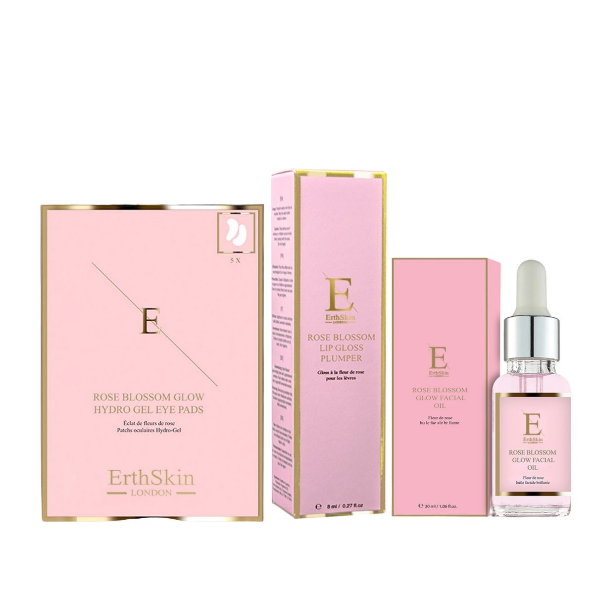 Roze verpakkingen met producten. Bevat oogpads, lipgloss en gezichtsolie. Merk: ErthSkin London.
