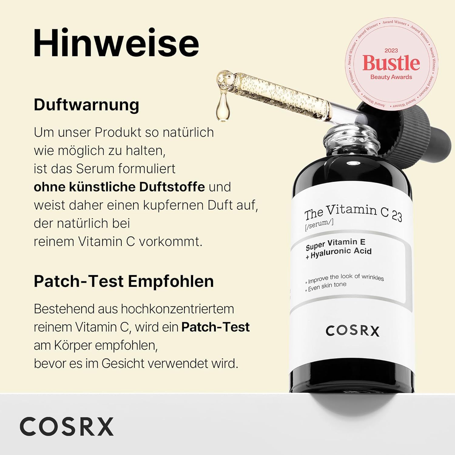 Flacon en verre avec pipette, nom du produit et logo COSRX. Prix 'Bustle Beauty Awards 2023'. Texte sur le parfum et le patch test.