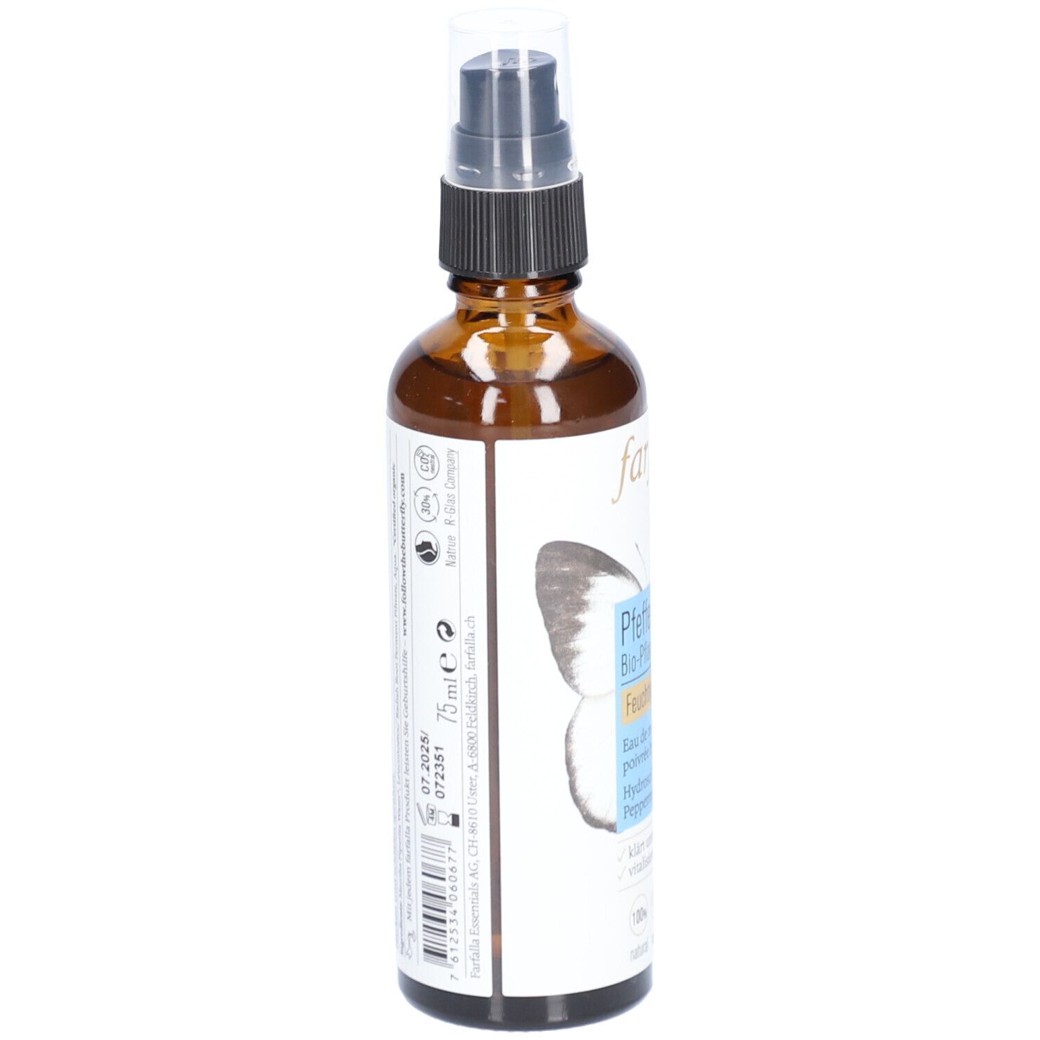 Flacon en verre brun avec vaporisateur. Étiquette avec informations produit et texte. Informations de fabrication et de durabilité.