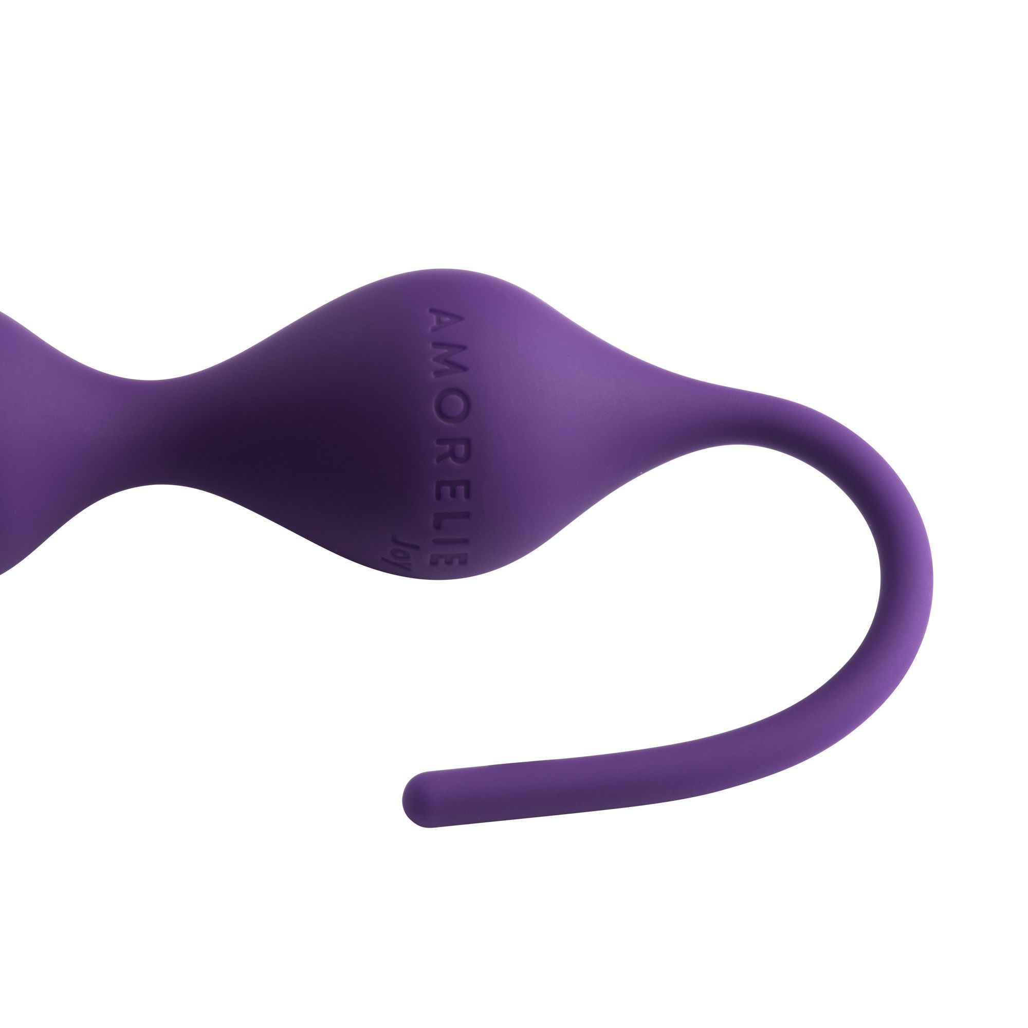 Gros plan sur les boules de plaisir violettes avec tige. La tige est incurvée et a une pointe arrondie.