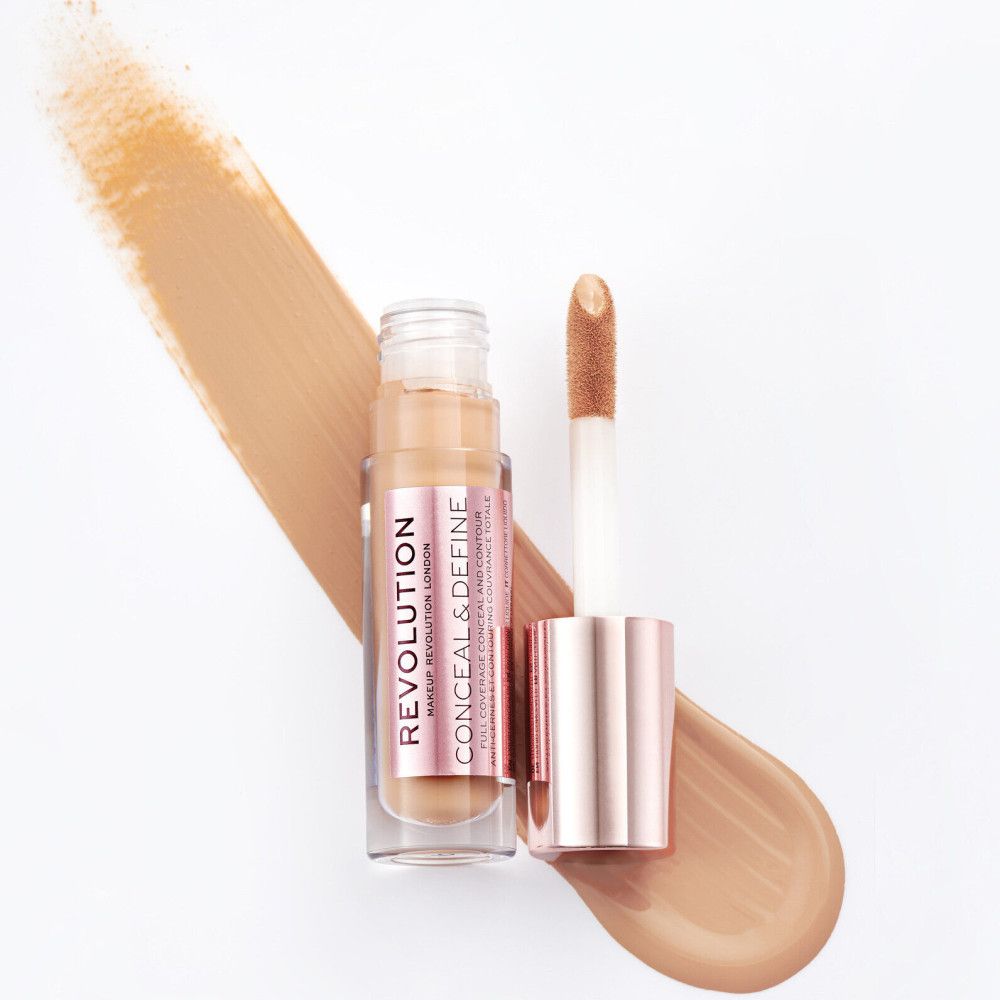 Flacon de correcteur avec applicateur et tache de couleur. Inscription: Makeup Revolution London, Conceal & Define.