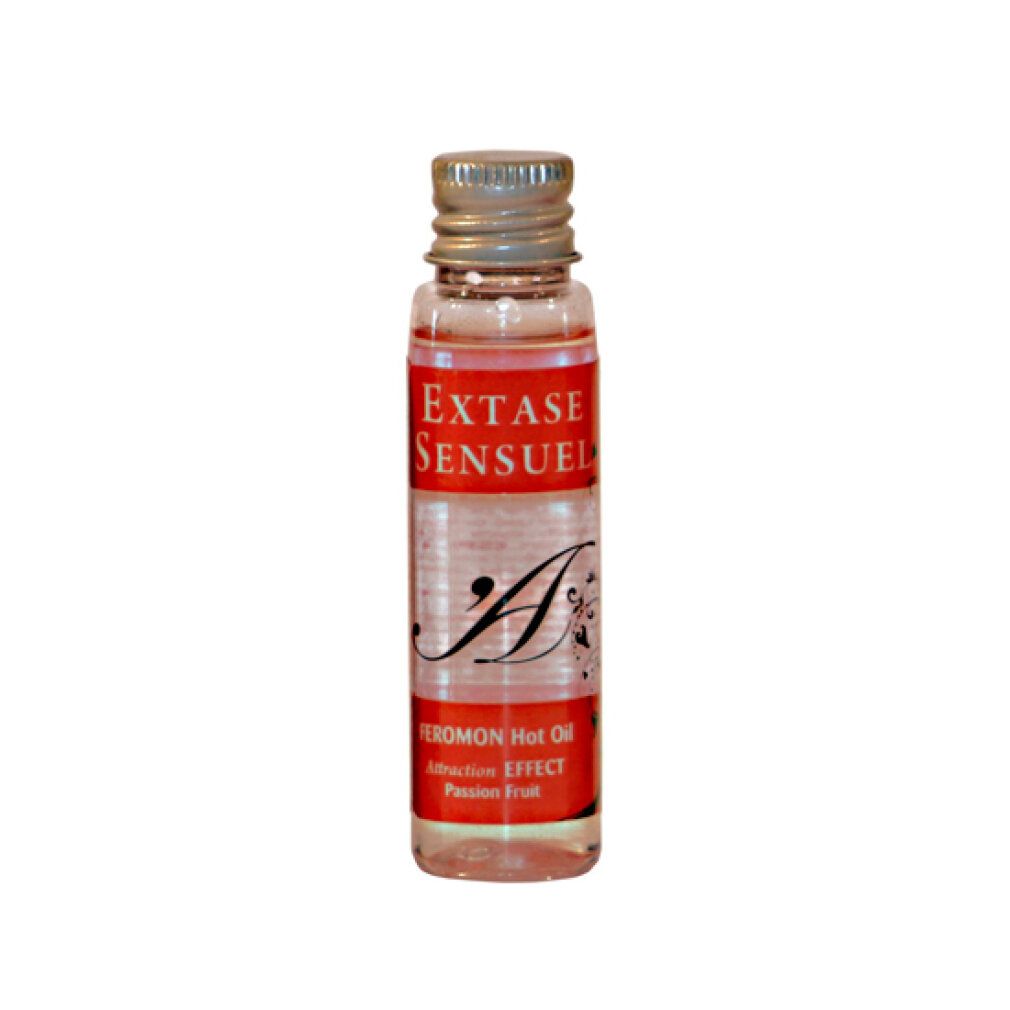Flacon transparent avec bouchon argenté. Étiquette "Extase Sensuel" et "Pheromon Hot Oil".