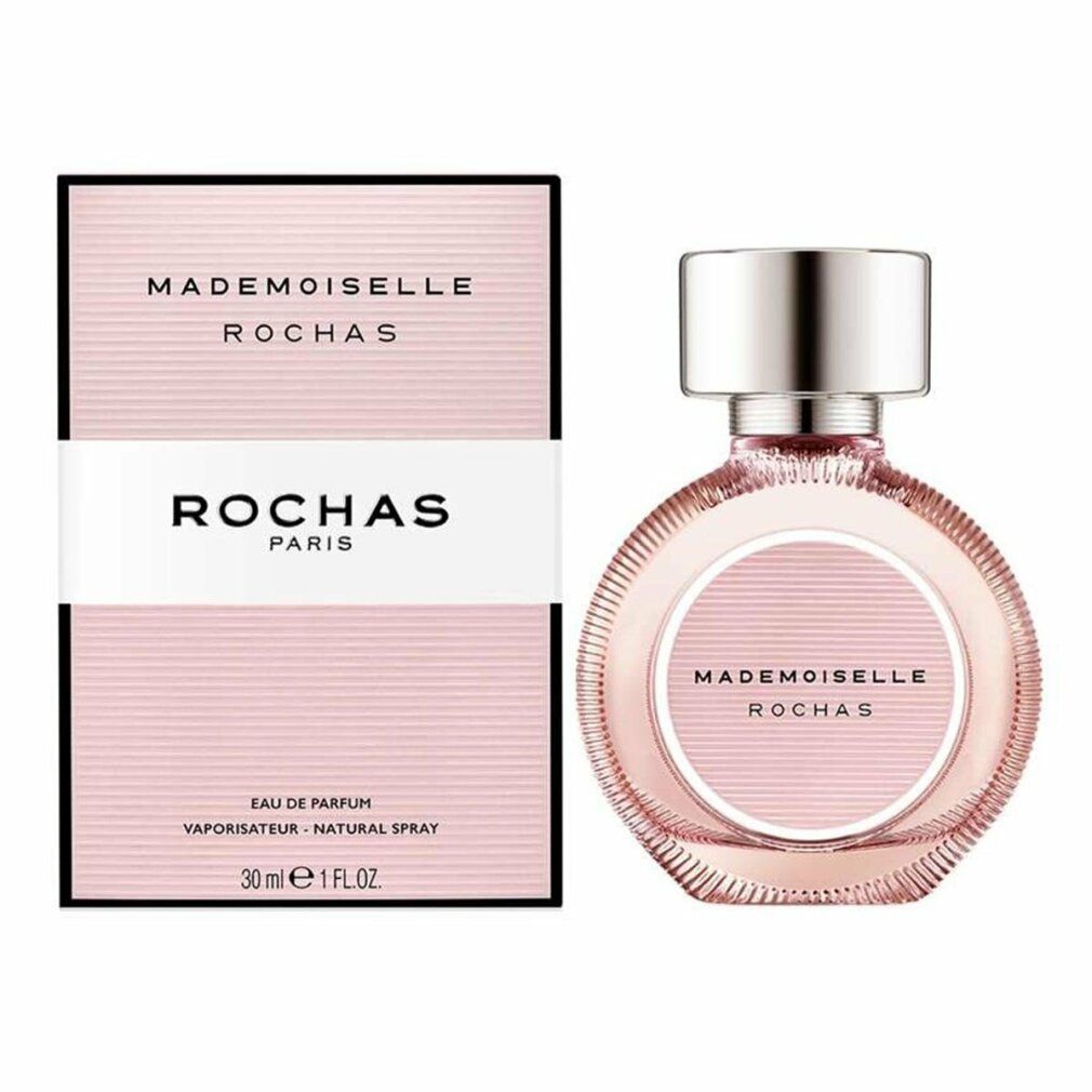 Flacon rose Rochas Mademoiselle Eau de Parfum avec bouchon argenté et emballage. Texte: Mademoiselle Rochas, Rochas Paris, 30 ml.