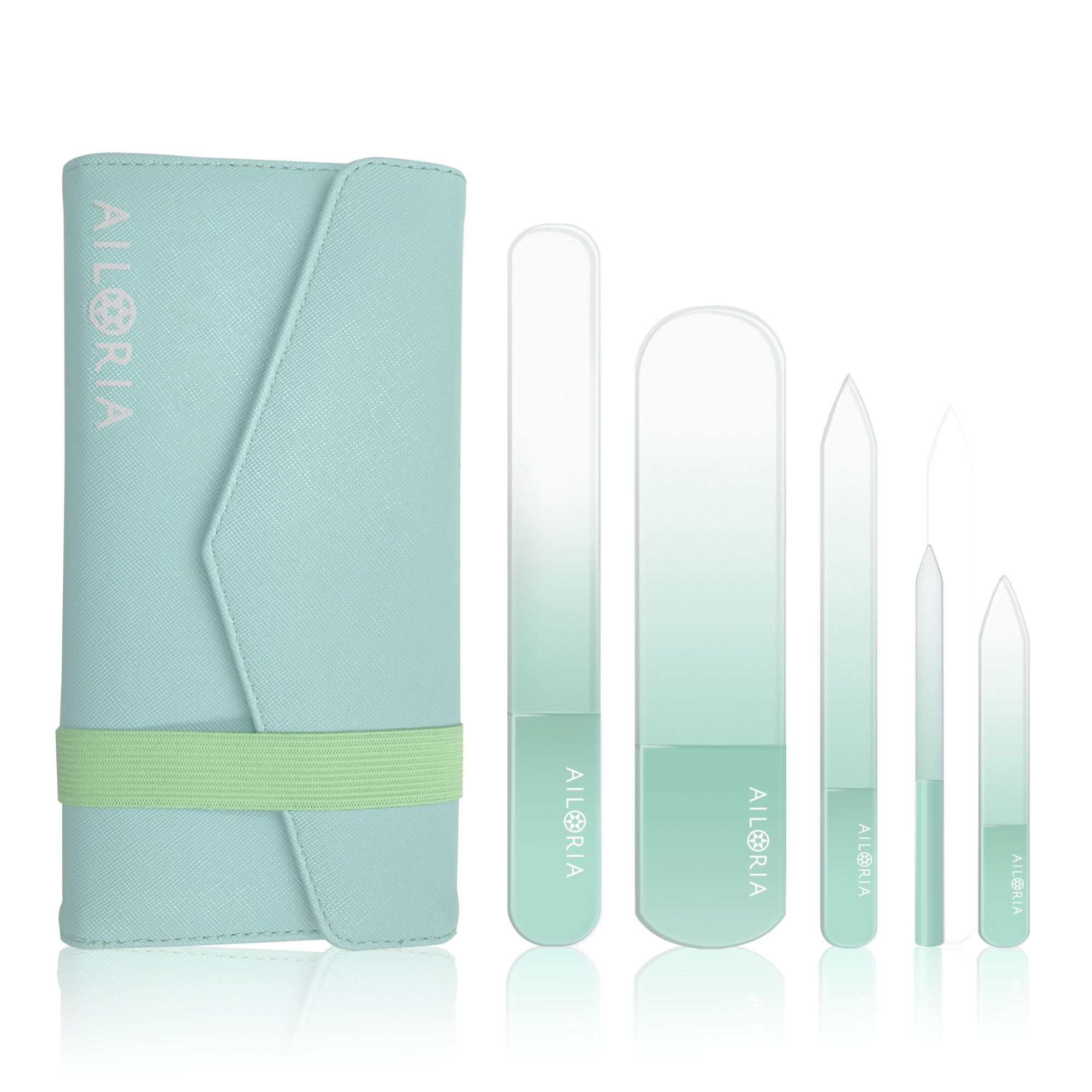 Set de limes à ongles en verre et étui bleu clair. Limes de différentes formes et tailles, dégradé de vert à transparent. Marque AILORIA.